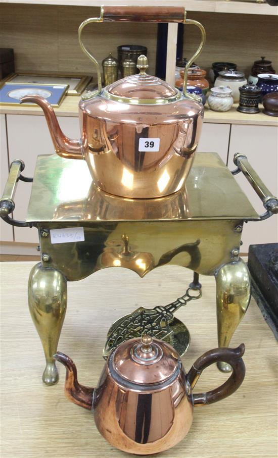 A brass footman, a copper kettle and a teapot, etc., footman height 30cm, width 46cm, depth 29cm